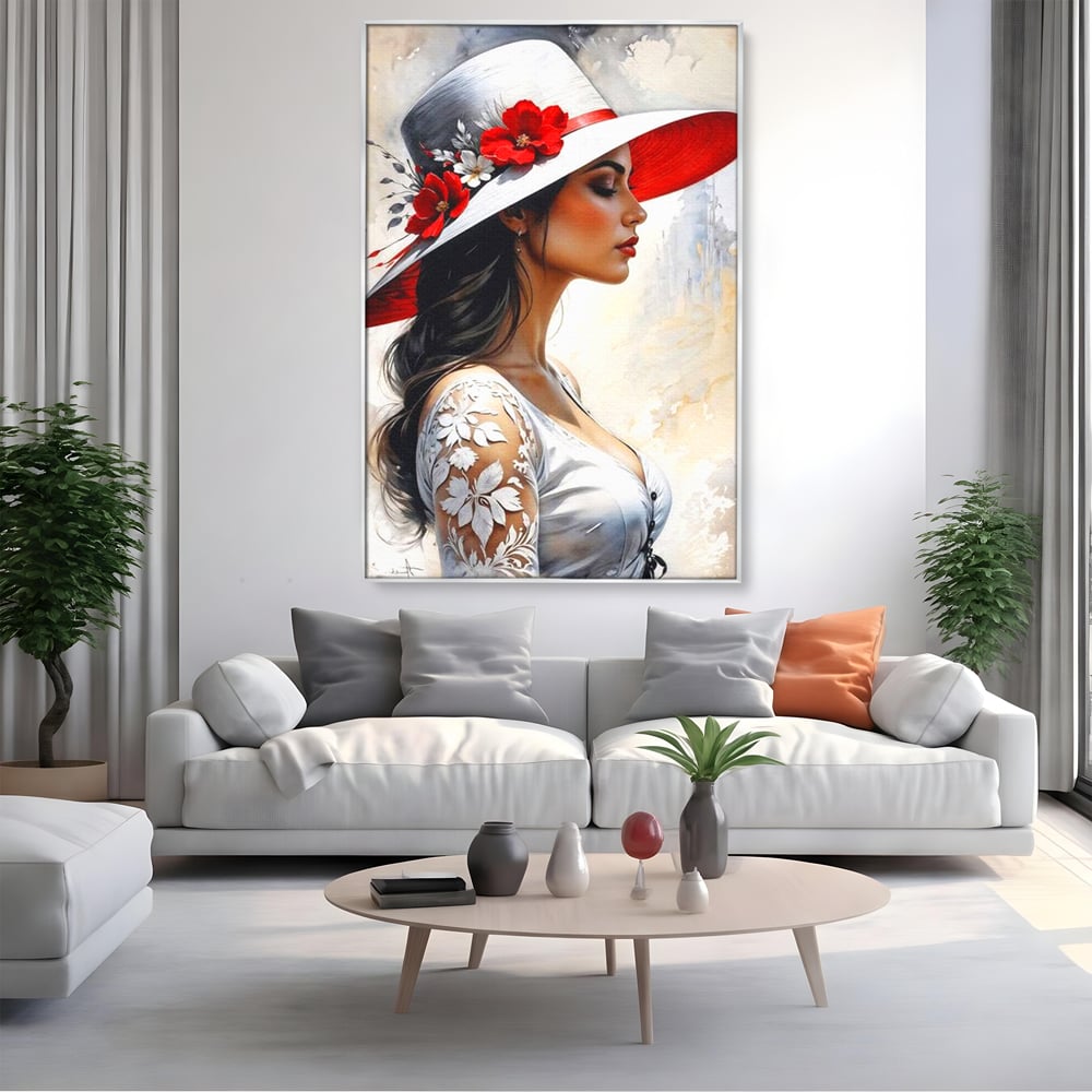 Tablou canvas cu tablou canvas cu profil de doamna, in rama de aluminiu argintiu, pe perete intr-un living